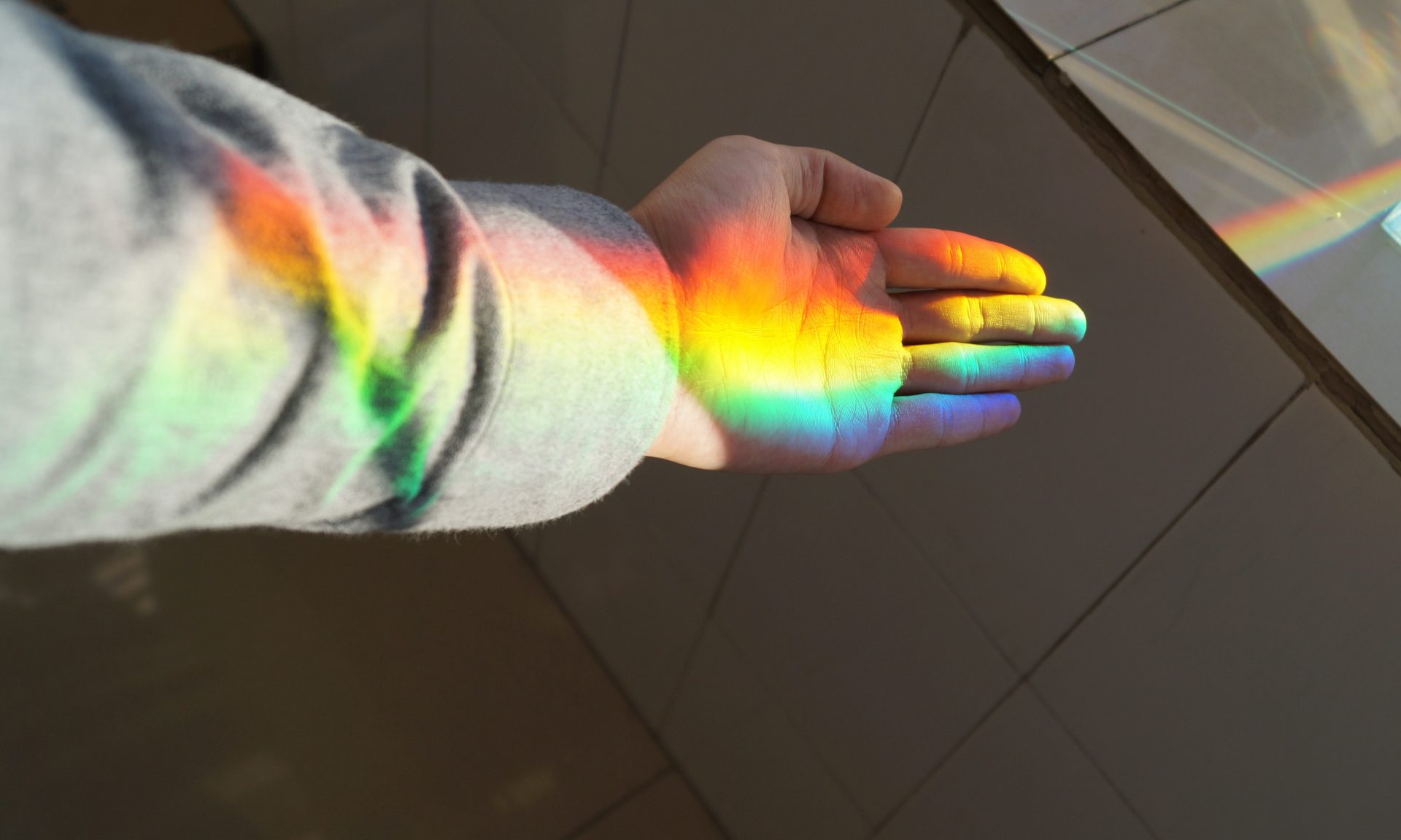 Hand illuminated with multi-colours